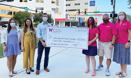 Presenting the $25,000 check to Johns Hopkins All Children's Hospital